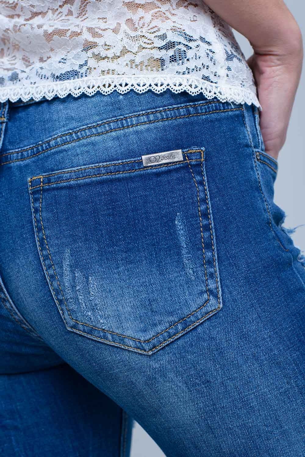 Jeans con strappi e orli a taglio grezzo. - Because I'm Different shop